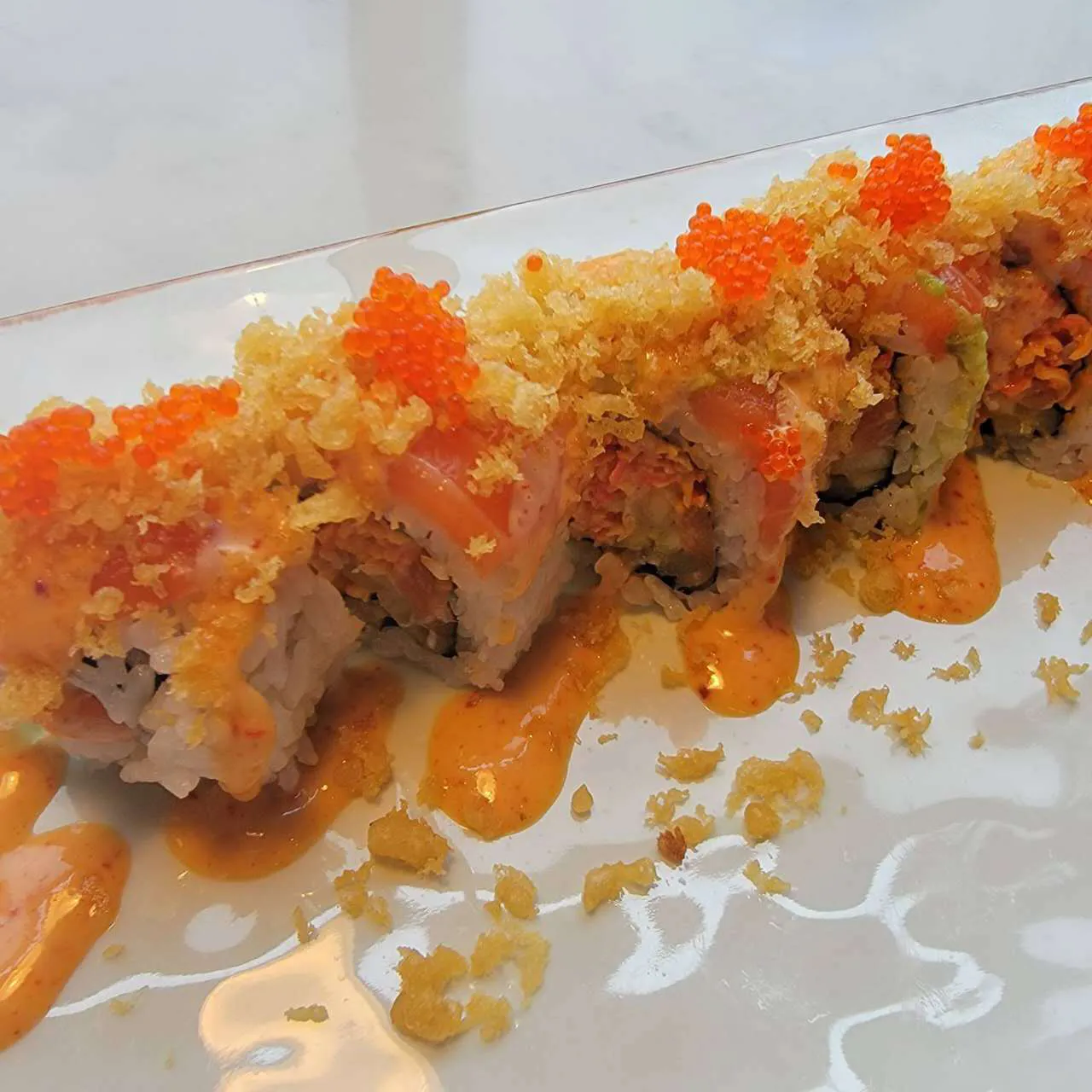 Crunchy salmon sushi roll with tobiko at Yen Sushi & Sake，a Japanese Restaurant in Hillsboro